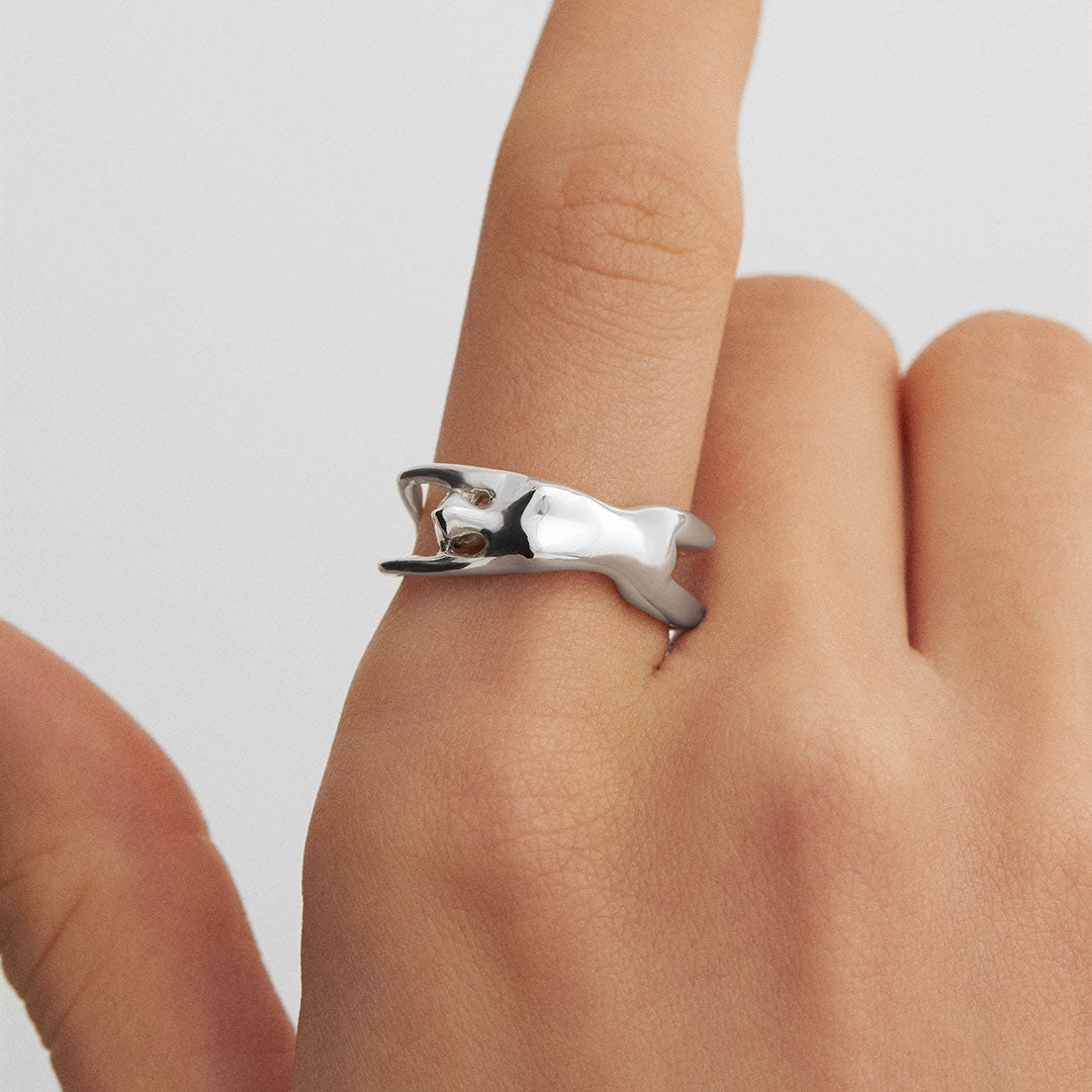 Model wearing a female body ring in sterling silver