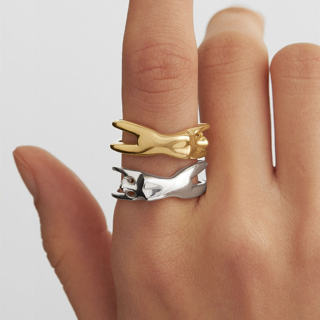Model wearing female body rings in sterling silver with 18k gold plating