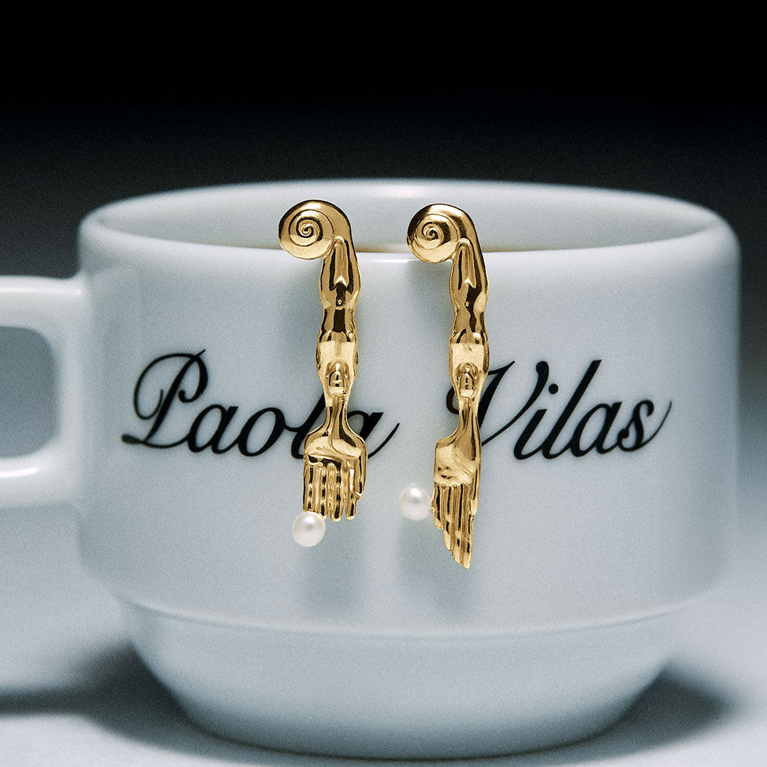 18k gold-plated sterling silver earring featuring mini surrealist fork and knife with natural pearls