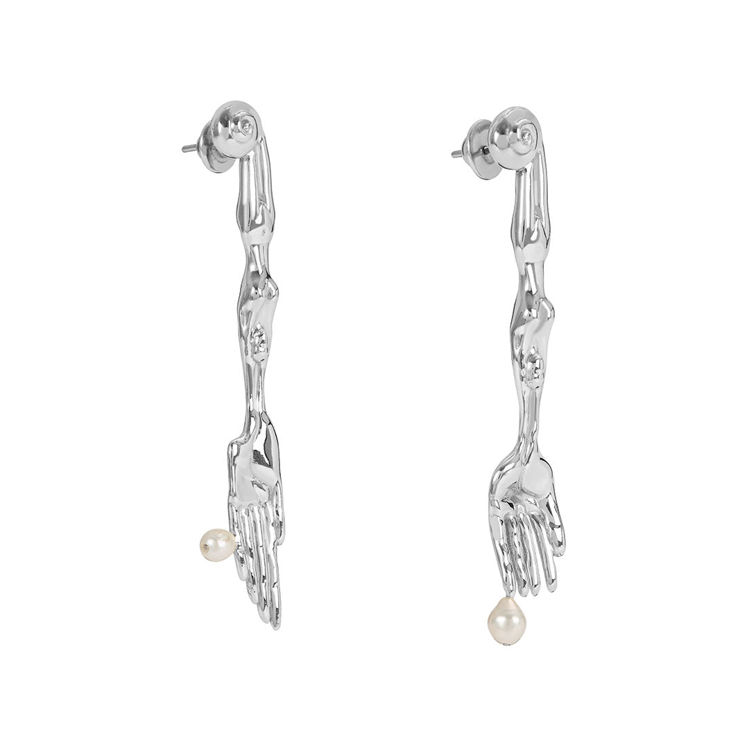 Paola Vilas surrealist fork and knife earring in sterling silver and natural pearls