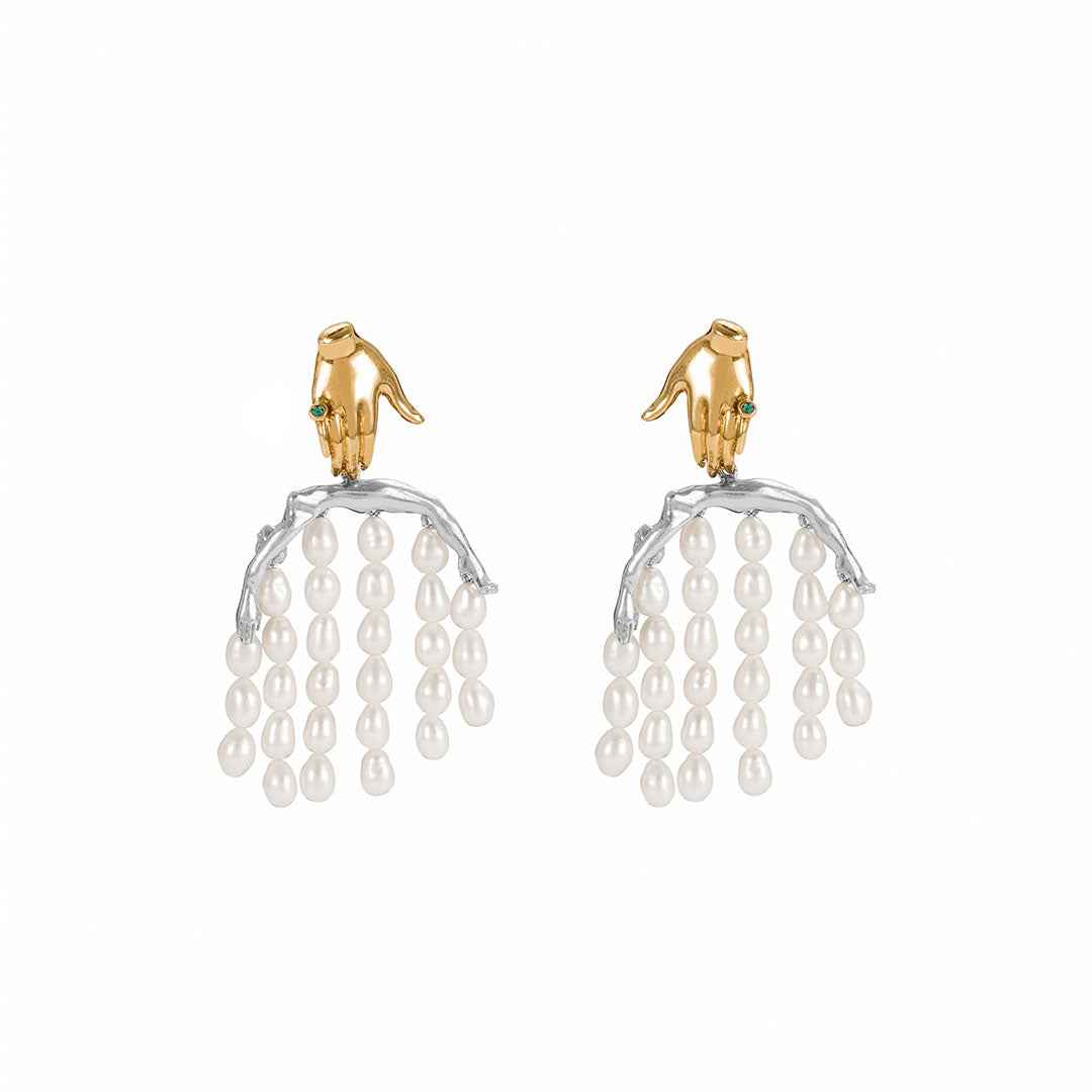 Paola Vilas earring in 18k gold-plated sterling silver featuring a hand and body with pearl strands