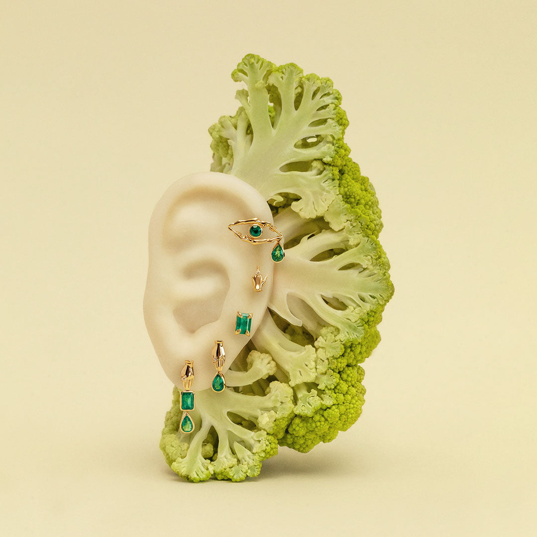 Paola Vilas earrings in 18k gold adorned with emeralds and diamonds