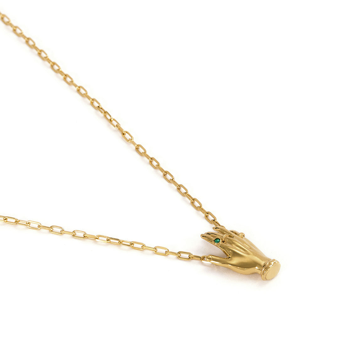 Paola Vilas necklace in sterling silver with 18k gold plating, hand adorned with emerald