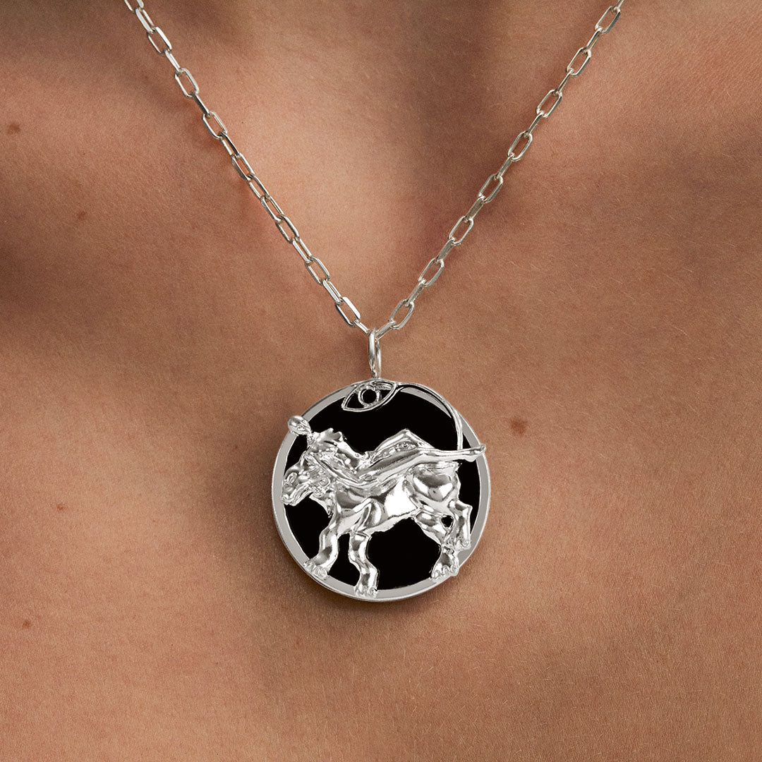 Model wearing Leo zodiac necklace in sterling silver