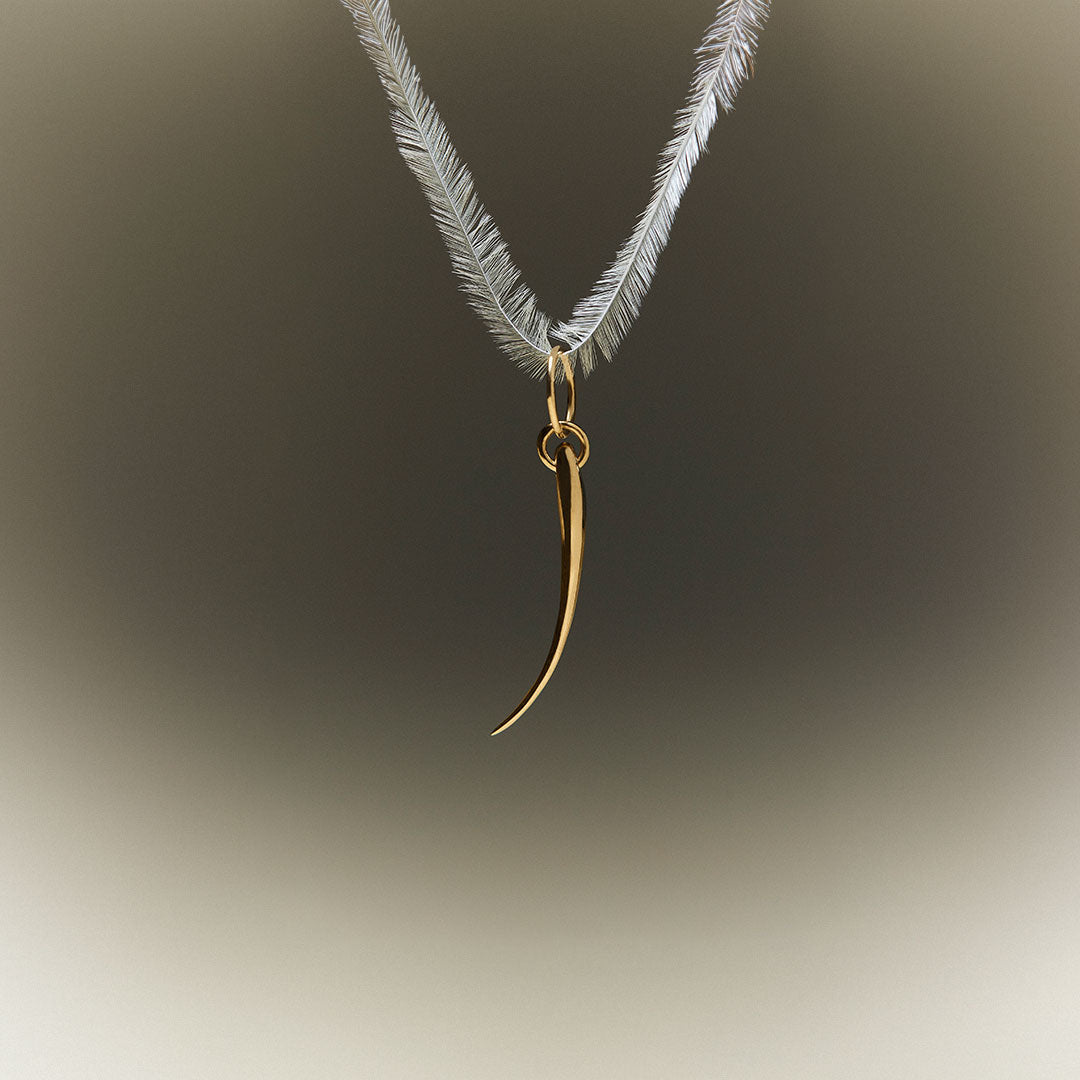 18k gold eyelash pendant