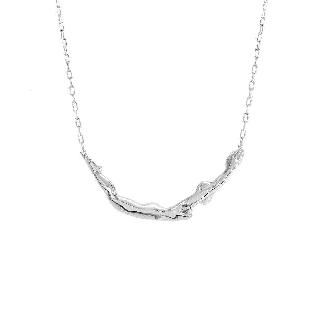 Paola Vilas necklace in sterling silver featuring a small female body