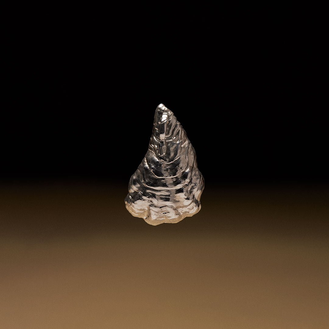 Oyster shell pendant in sterling silver