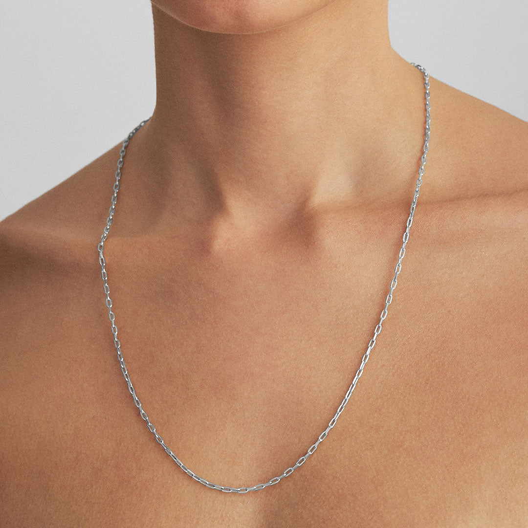 Model wearing 60cm Cartier chain in sterling silver