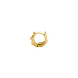 Paola Vilas 18k gold hoop piercing of a female body