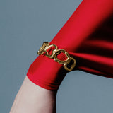 PAOLA-VILAS-EARRINGS-GOLD-PLATED-JEWELRY-WOMAN-SCULPTURE-ART-BRACELET