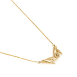 Paola Vilas necklace of hands in 18k gold with diamond
