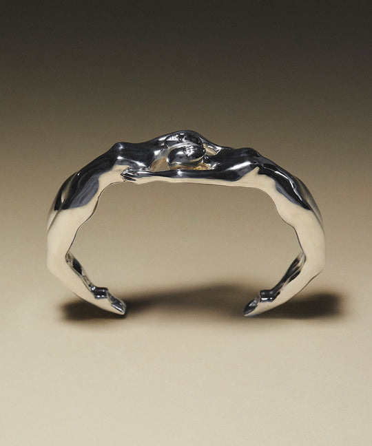 Sterling silver bracelet with fused female bodies
