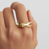 Model wearing a female body ring in sterling silver with 18k gold plating