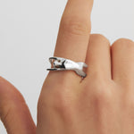 Model wearing a female body ring in sterling silver