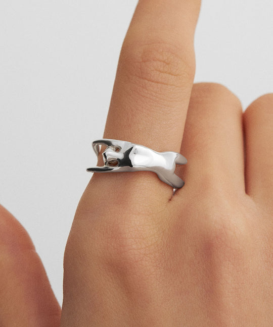 Model wearing a female body ring in sterling silver