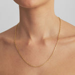 Model wearing 50cm Cartier chain in sterling silver with 18k gold plating