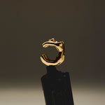 Female body earcuff in sterling silver with 18k gold plating
