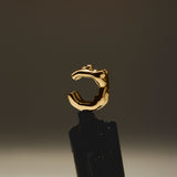 Female body earcuff in sterling silver with 18k gold plating