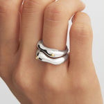 Model wearing organic nipple rings in sterling silver