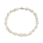 Paola Vilas necklace with baroque pearls and sterling silver hand with emerald