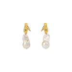 Paola Vilas hand earring in sterling silver with 18k gold plating, emerald, and baroque pearl