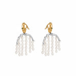 Paola Vilas earring in 18k gold-plated sterling silver featuring a hand and body with pearl strands