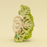 Paola Vilas earrings in 18k gold adorned with emeralds and diamonds
