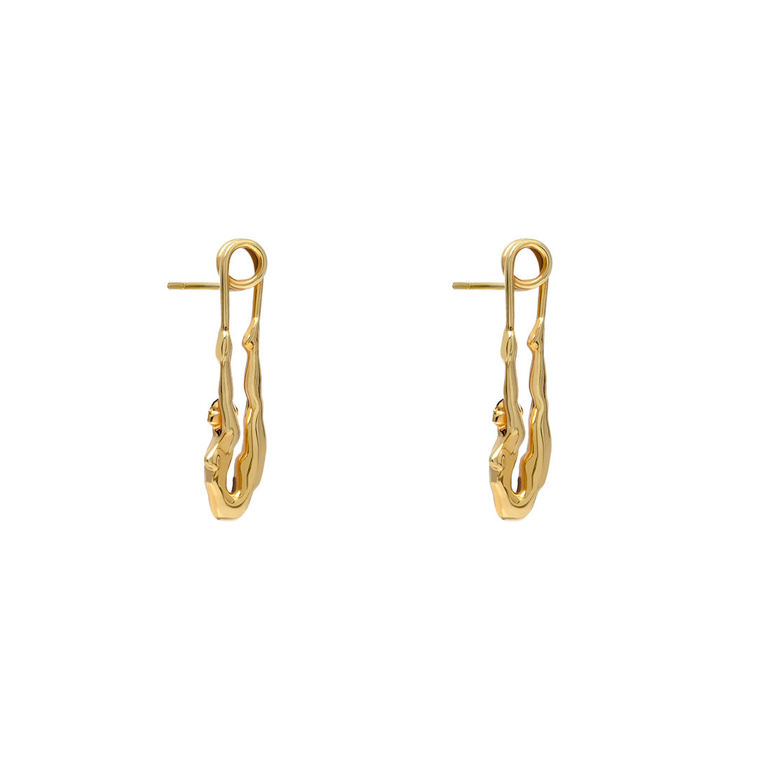 Paola Vilas safety pin earring with female body in sterling silver with 18k gold plating
