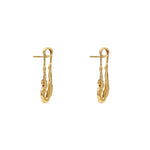 Paola Vilas safety pin earring with female body in sterling silver with 18k gold plating