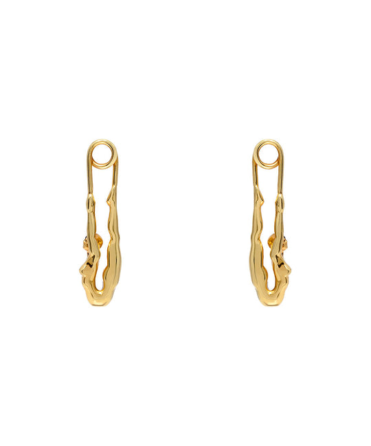 Paola Vilas earring in sterling silver with 18k gold plating featuring a safety pin and female body