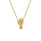 Paola Vilas necklace in sterling silver with 18k gold plating featuring a hand adorned with emerald