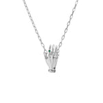 Paola Vilas necklace in sterling silver featuring a hand adorned with emerald