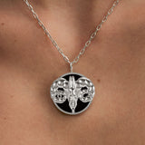 Model wearing Aries zodiac necklace in sterling silver