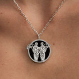 Model wearing Gemini zodiac necklace in sterling silver