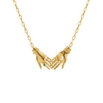 Paola Vilas joined hands necklace in sterling silver with 18k gold plating and emerald