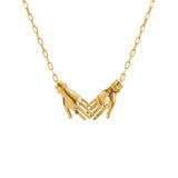 Paola Vilas joined hands necklace in sterling silver with 18k gold plating and emerald