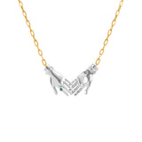 Paola Vilas joined hands necklace in sterling silver with 18k gold-plated chain and emerald