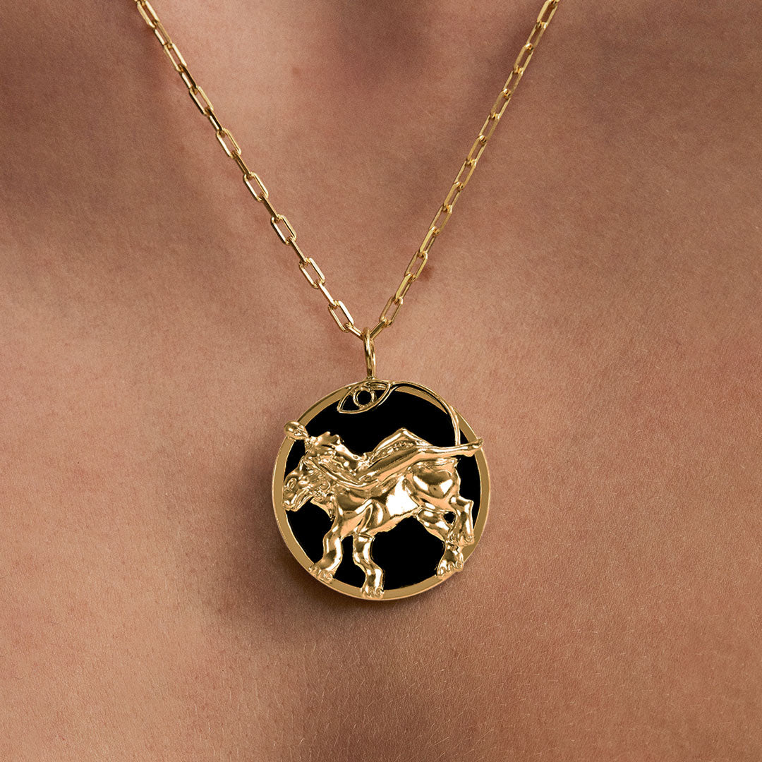 Model wearing Leo zodiac necklace in sterling silver with 18k gold plating