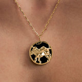 Model wearing Leo zodiac necklace in sterling silver with 18k gold plating