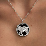 Model wearing Leo zodiac necklace in sterling silver