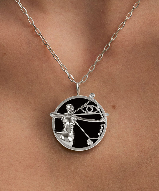 Model wearing Sagittarius zodiac necklace in sterling silver