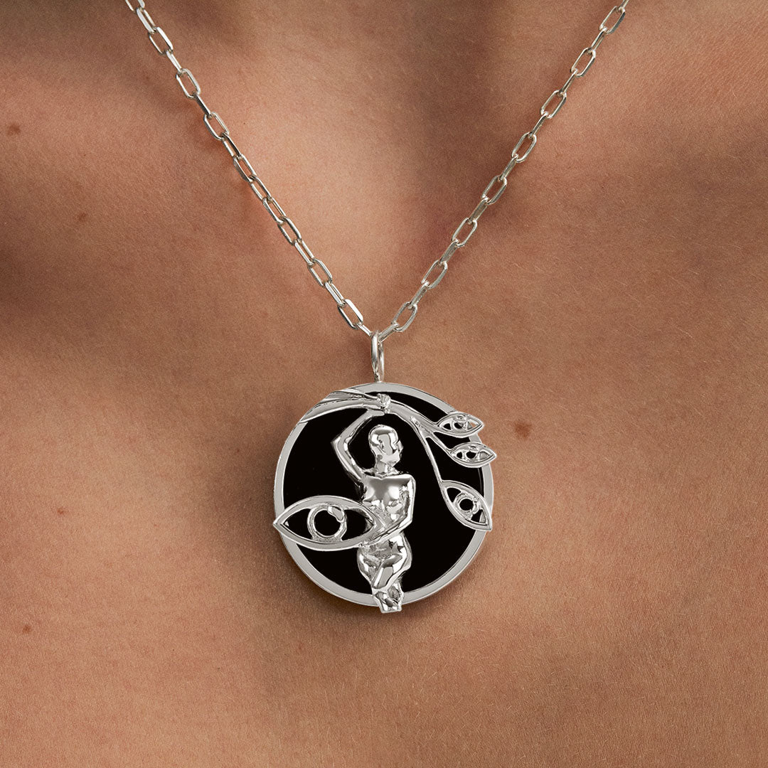 Model wearing Virgo zodiac necklace in sterling silver