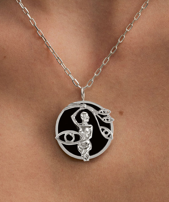 Model wearing Virgo zodiac necklace in sterling silver