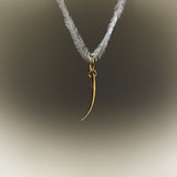18k gold eyelash pendant