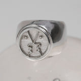 Paola Vilas chevalier ring in sterling silver of minimalistic faces