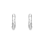 Paola Vilas earring in sterling silver featuring a safety pin and female body