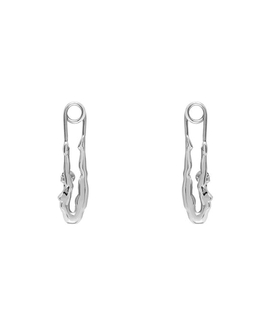 Paola Vilas earring in sterling silver featuring a safety pin and female body