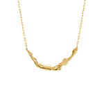 Paola Vilas necklace in sterling silver with 18k gold plating featuring a small female body