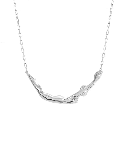 Paola Vilas necklace in sterling silver featuring a small female body