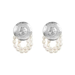 Paola Vilas sterling silver nipple earring with strands of natural pearls
